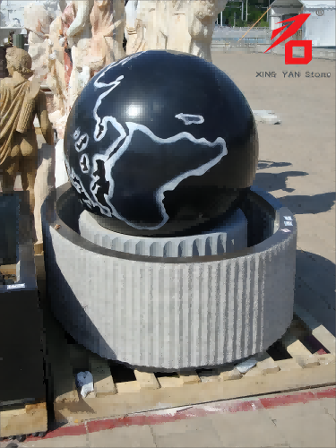Fontän med granitboll